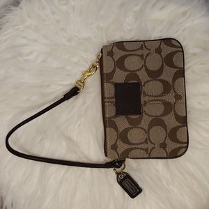 Canvas wristlet by Coach